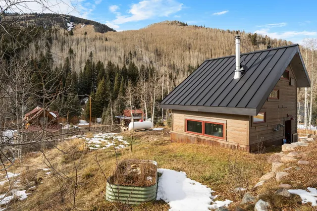 a view of a backyard with snow