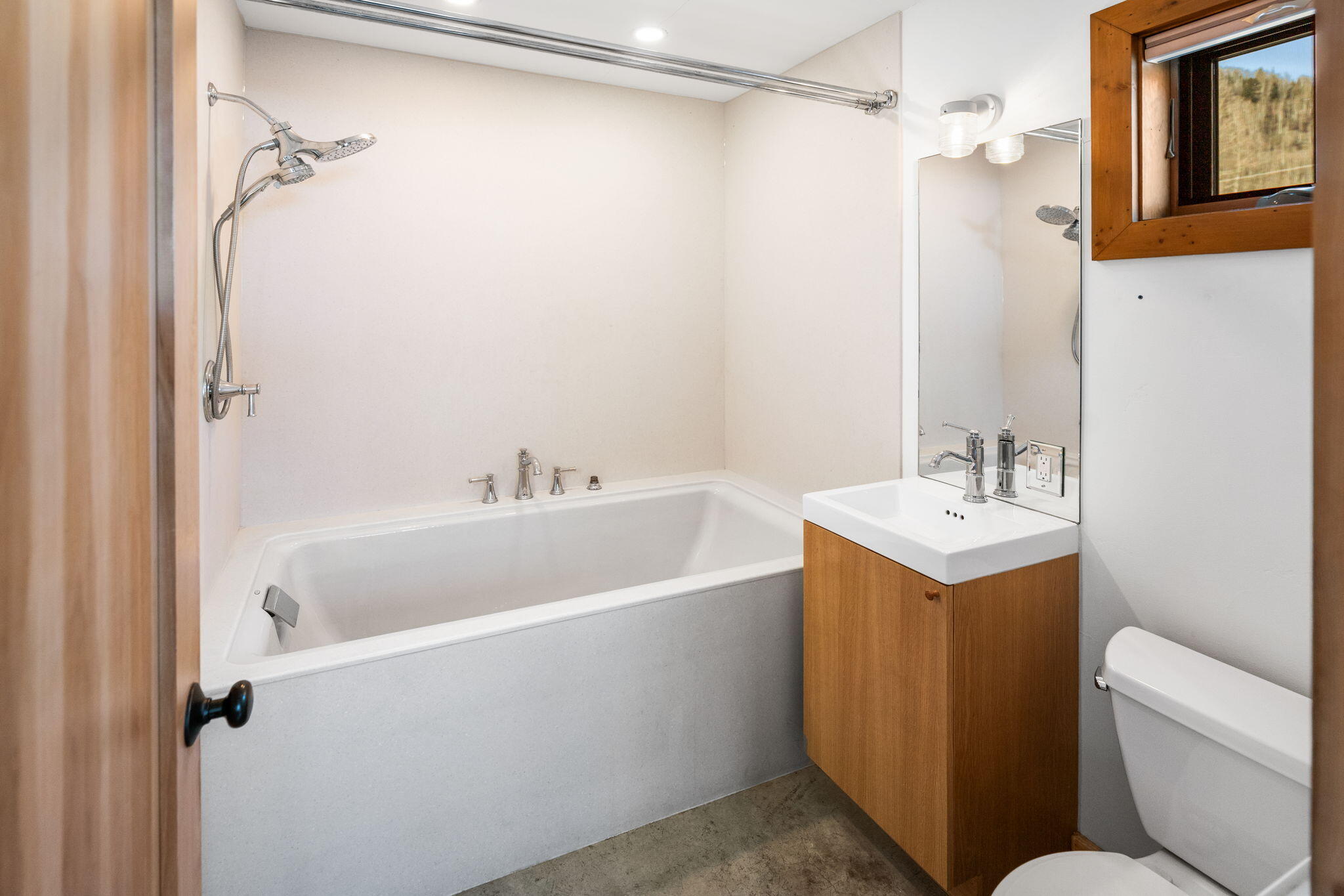 135 West Soda Street Rico, CO 81332 - Photo 7 of 47 a white bath tub sitting next to a white sink and a shower