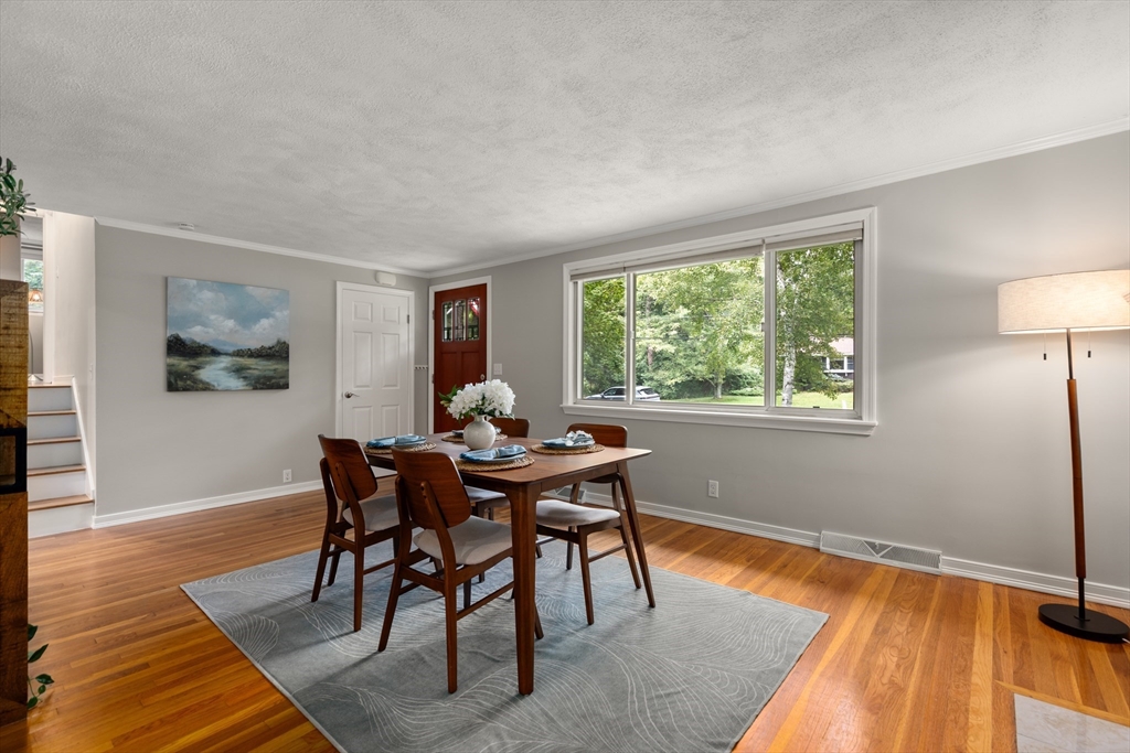 73 Willow Road Sudbury, MA 01776 - Photo 16 of 41 a workspace with furniture a rug and wooden floor