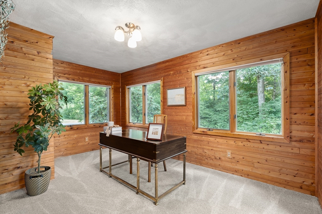 73 Willow Road Sudbury, MA 01776 - Photo 18 of 41 a living room with furniture and a potted plant