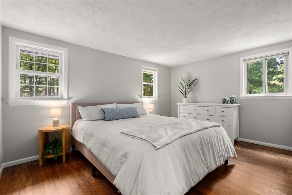 73 Willow Road Sudbury, MA 01776 - Photo 20 of 41 a bedroom with a bed and a window