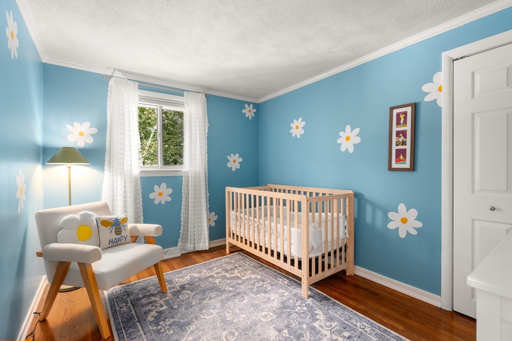 73 Willow Road Sudbury, MA 01776 - Photo 21 of 41 a bed room with a bed and a window