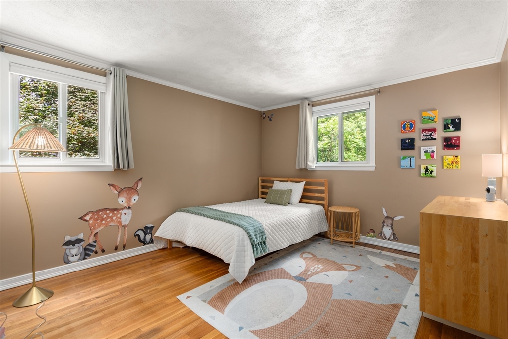 73 Willow Road Sudbury, MA 01776 - Photo 23 of 41 a bedroom with a bed and a window