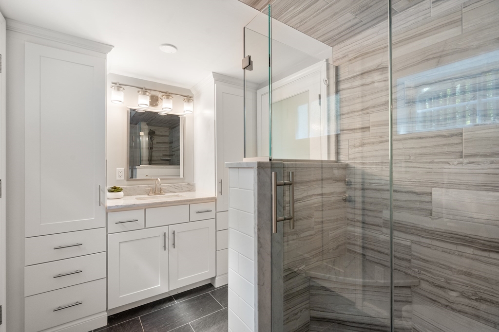 73 Willow Road Sudbury, MA 01776 - Photo 25 of 41 a bathroom with a shower and a sink