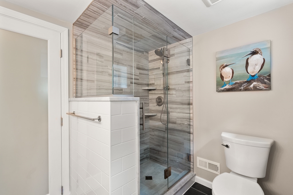 73 Willow Road Sudbury, MA 01776 - Photo 26 of 41 a bathroom with a shower and toilet