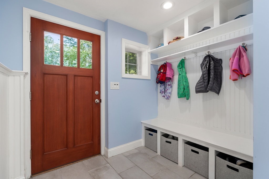 73 Willow Road Sudbury, MA 01776 - Photo 28 of 41 a view of an entryway with wooden floor