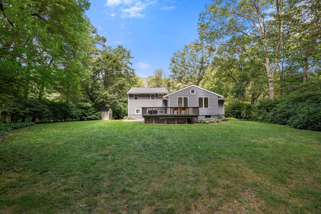 73 Willow Road Sudbury, MA 01776 - Photo 36 of 41 a house view with a garden space