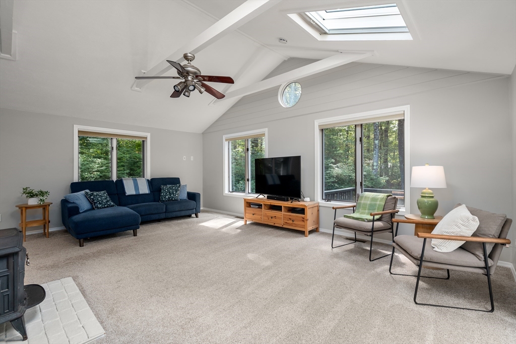 73 Willow Road Sudbury, MA 01776 - Photo 5 of 41 a living room with furniture and a flat screen tv