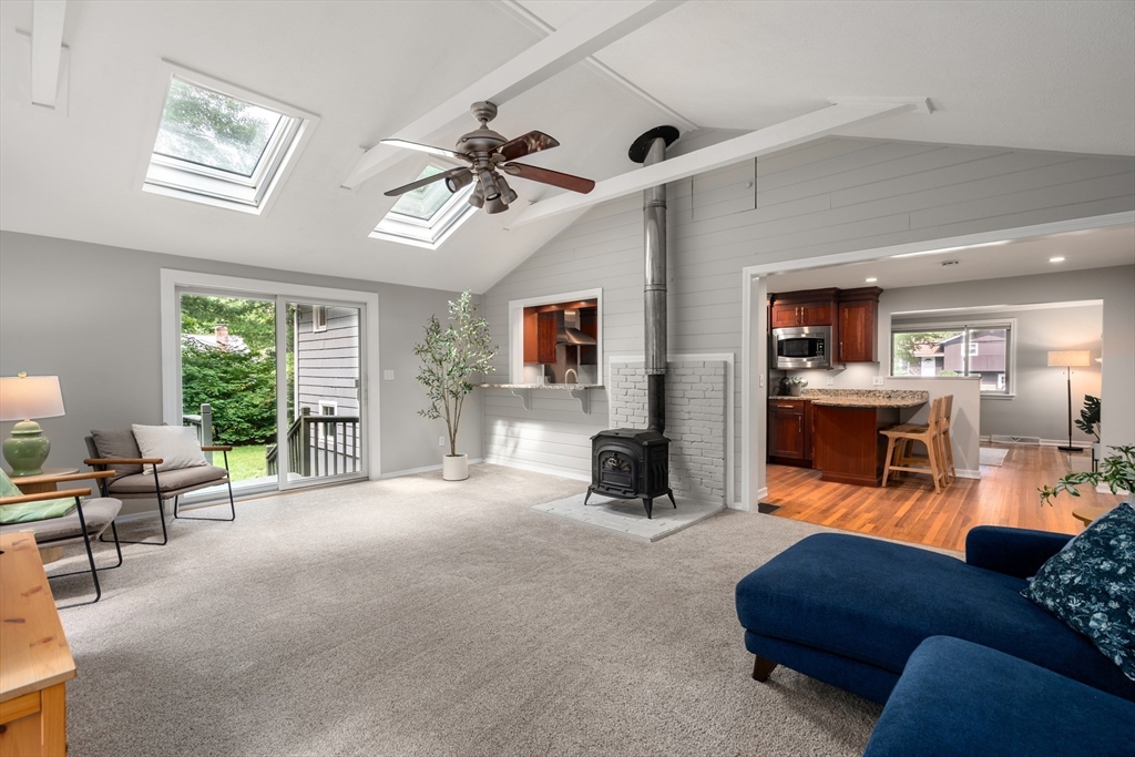 73 Willow Road Sudbury, MA 01776 - Photo 8 of 41 a living room with furniture and a flat screen tv