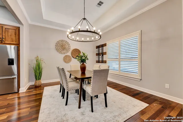 a view of a dining room with furniture