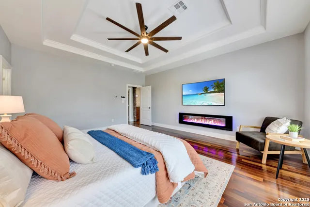 a bathroom with a double vanity sink toilet and mirror
