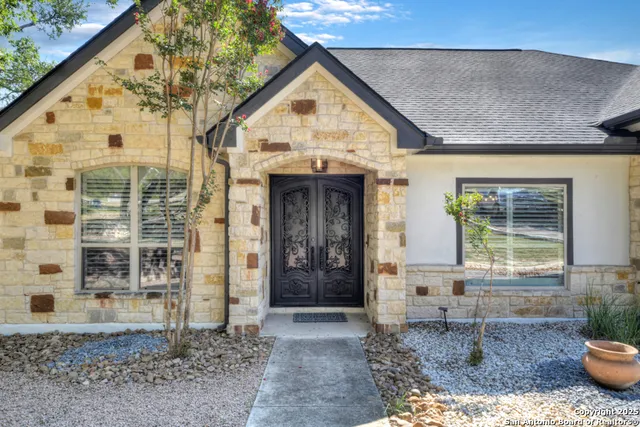 a view of gallery with wooden floor