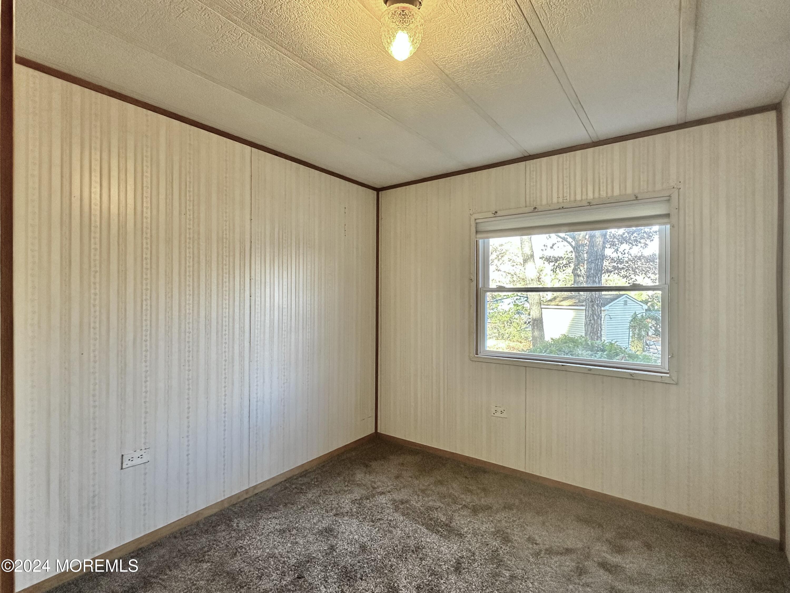 2 Rose Drive Jackson, NJ 08527 - Photo 13 of 20 an empty room with a window
