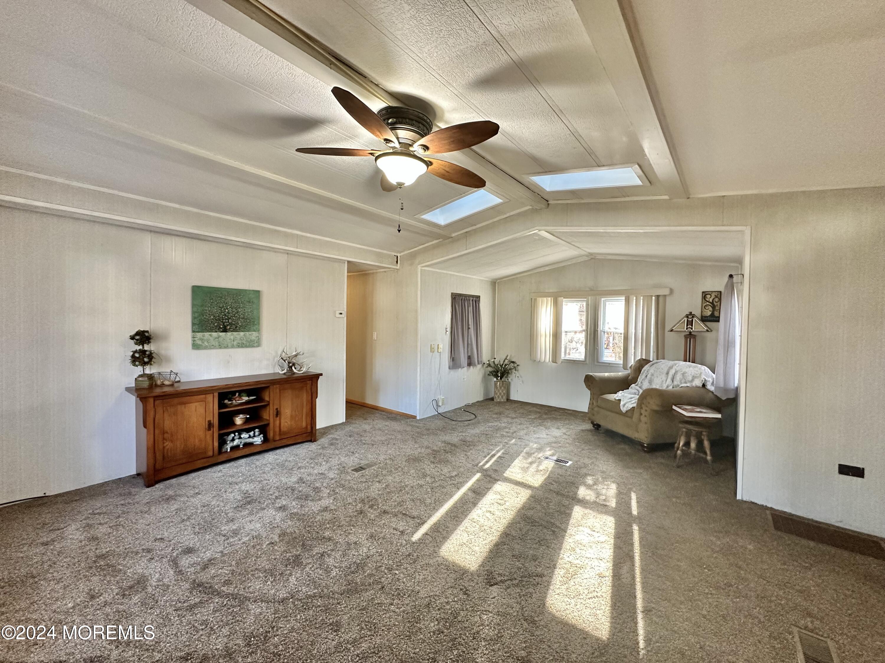 2 Rose Drive Jackson, NJ 08527 - Photo 7 of 20 a living room with furniture and a flat screen tv