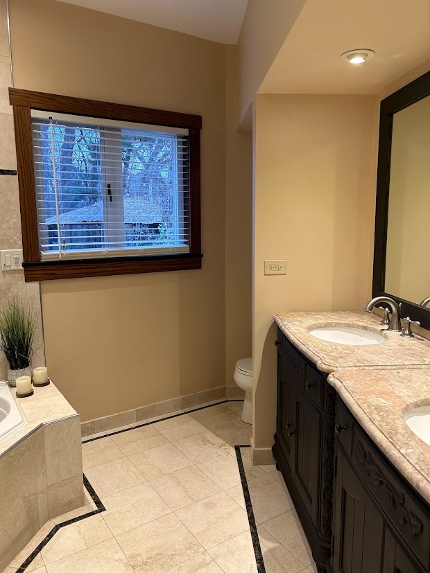 280 Maplewood Road Riverside, IL 60546 - Photo 12 of 30 a bathroom with a granite countertop sink a toilet and a mirror