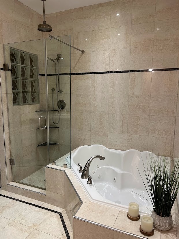 280 Maplewood Road Riverside, IL 60546 - Photo 13 of 30 a bathroom with a tub and a shower