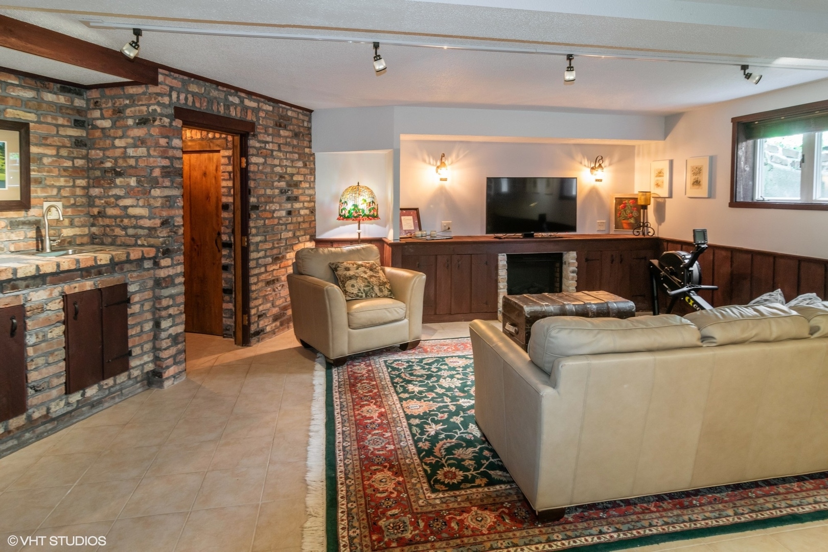 280 Maplewood Road Riverside, IL 60546 - Photo 18 of 30 a living room with furniture and a flat screen tv