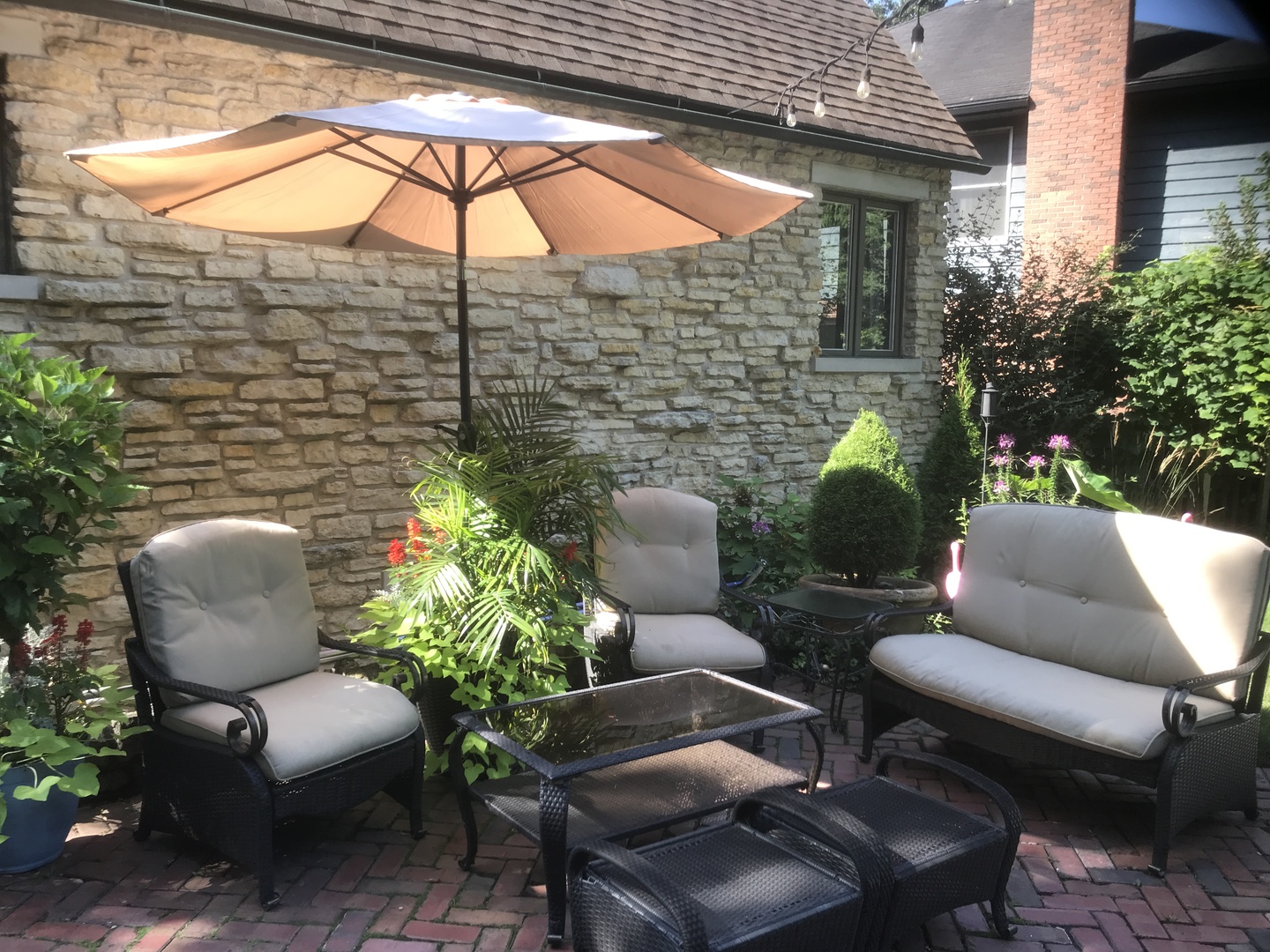 280 Maplewood Road Riverside, IL 60546 - Photo 23 of 30 a view of patio with a table and chairs and potted plants