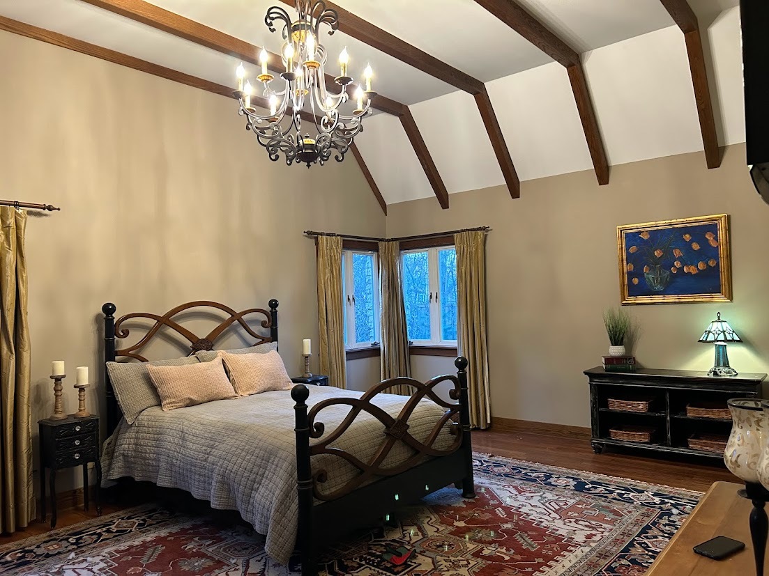 280 Maplewood Road Riverside, IL 60546 - Photo 10 of 30 a bedroom with a bed and wooden floor