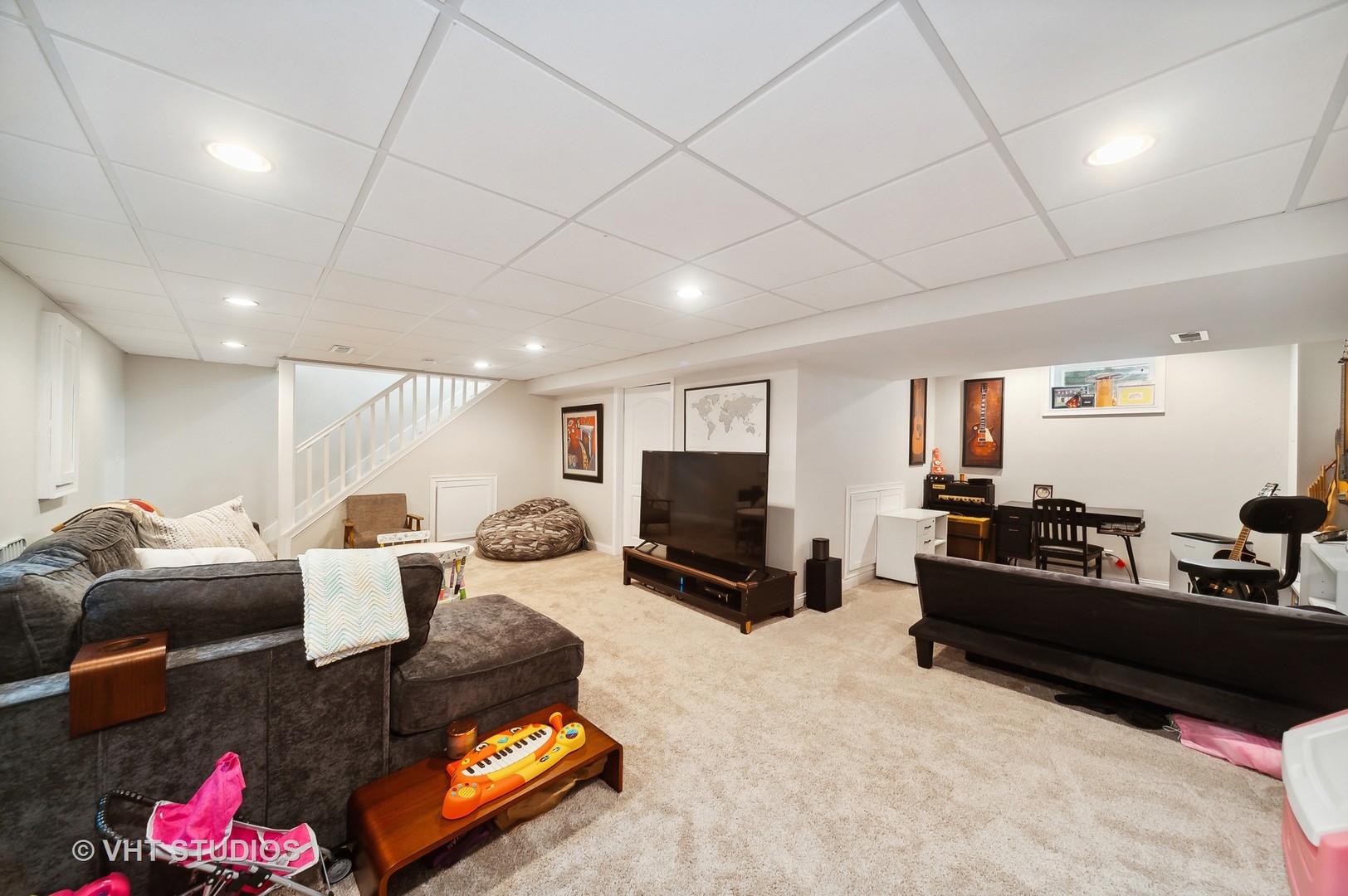 68 West Old Elm Road Lake Forest, IL 60045 - Photo 13 of 19 a living room with furniture and a flat screen tv