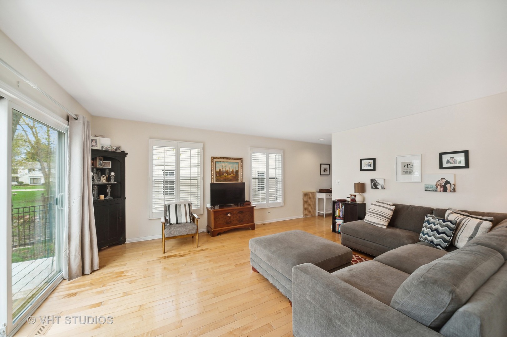 68 West Old Elm Road Lake Forest, IL 60045 - Photo 3 of 19 a living room with furniture window and a flat screen tv