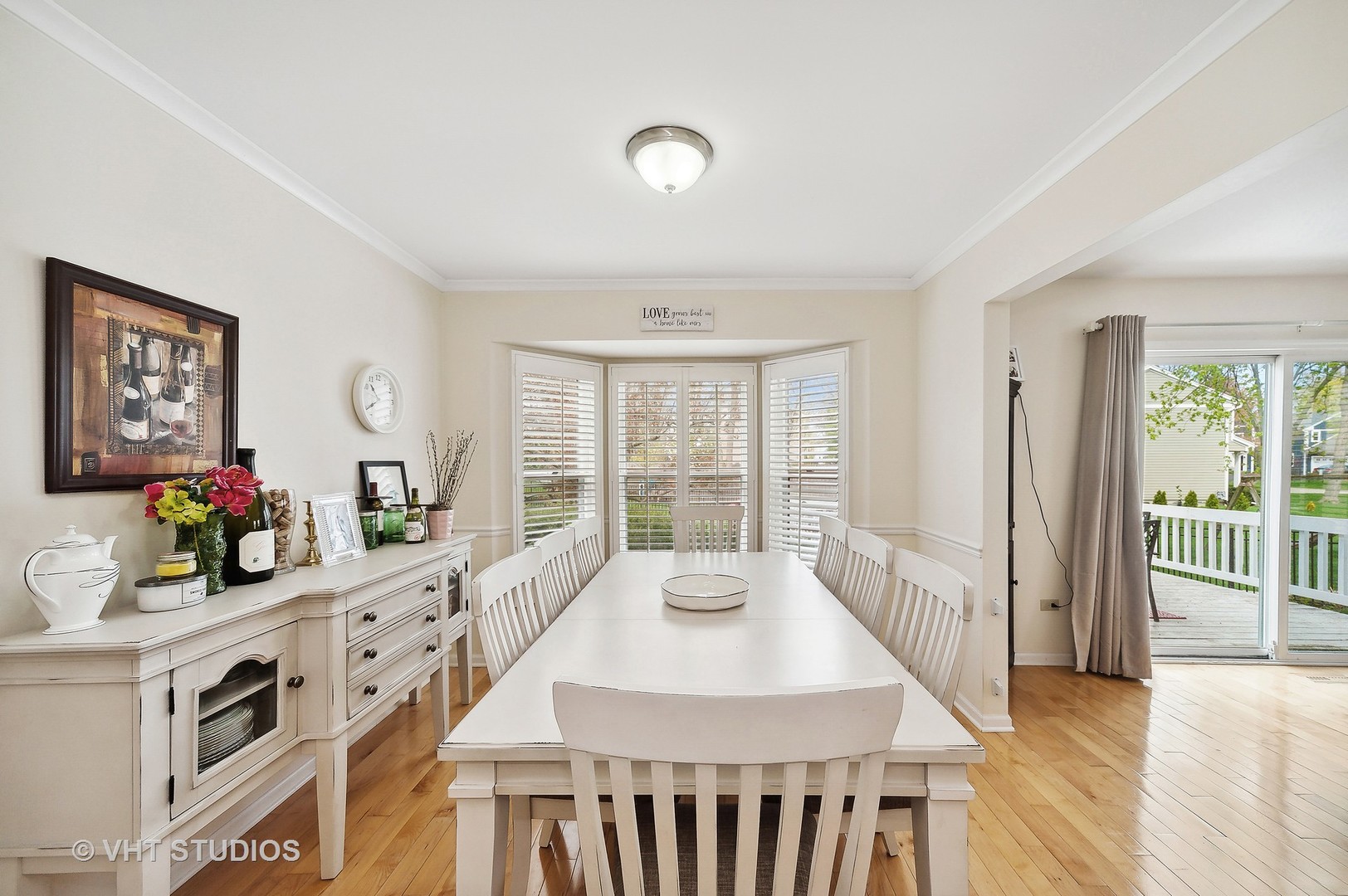 68 West Old Elm Road Lake Forest, IL 60045 - Photo 5 of 19 a view of a dining room and hall with wooden floor