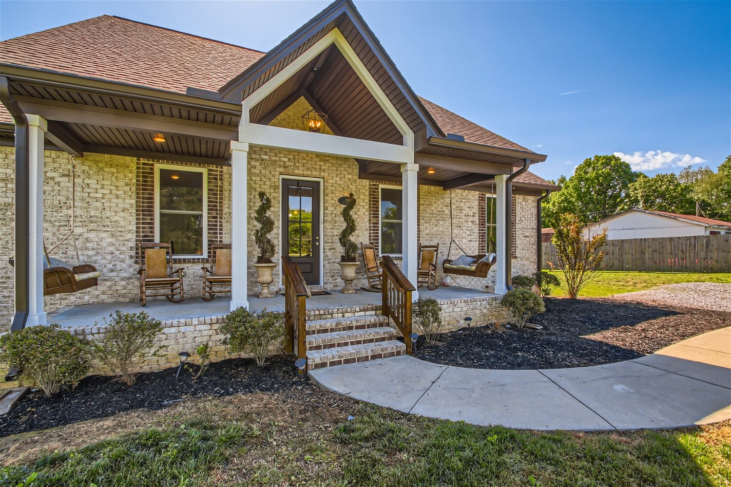 190 Mitchell Road Portland, TN 37148 - Photo 1 of 28 a front view of a house with garden