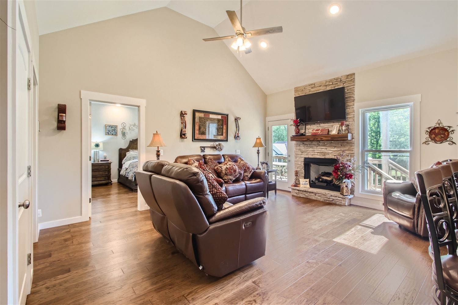 190 Mitchell Road Portland, TN 37148 - Photo 14 of 28 a living room with furniture a fireplace and a flat screen tv