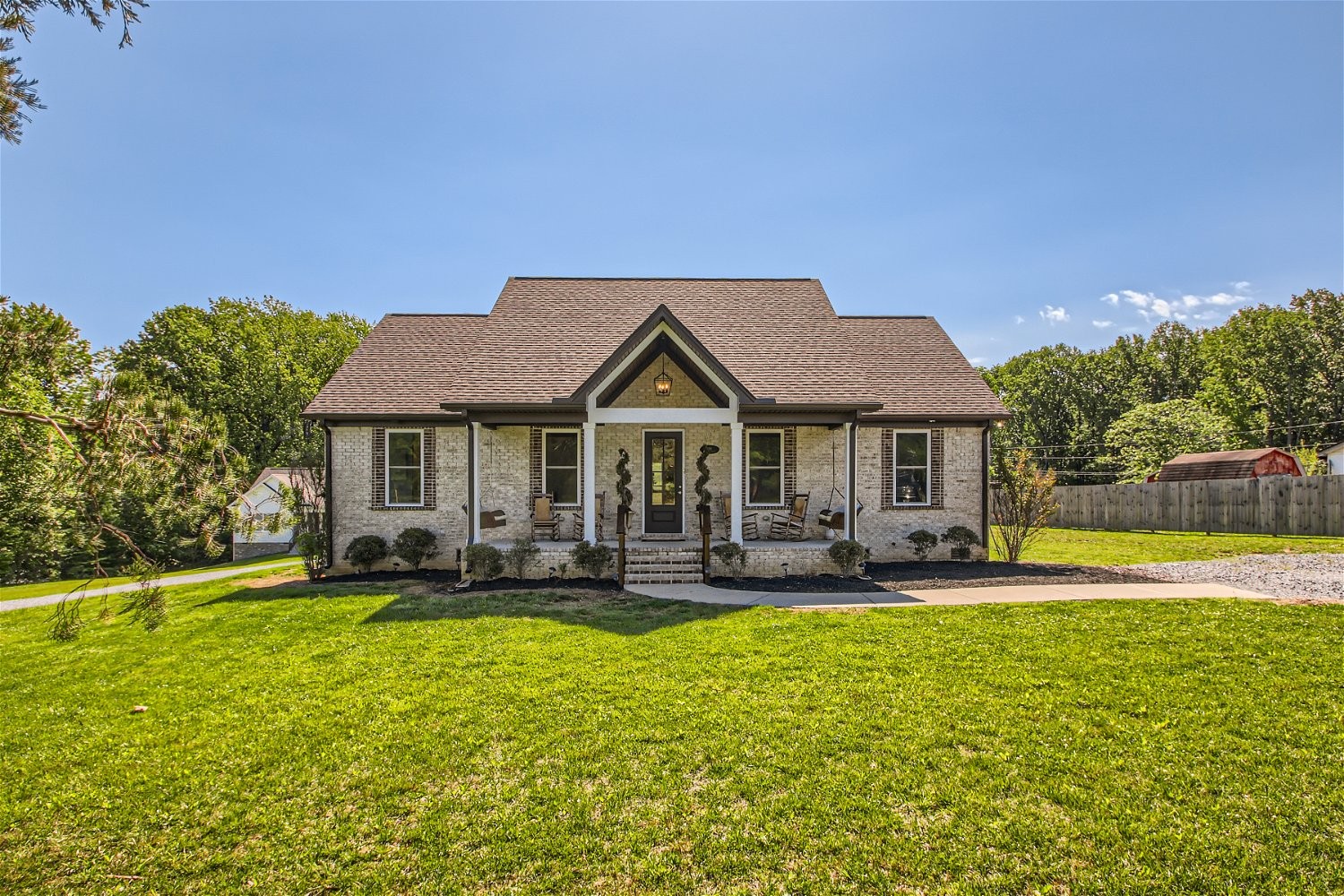 190 Mitchell Road Portland, TN 37148 - Photo 2 of 28 a front view of house with yard and outdoor seating