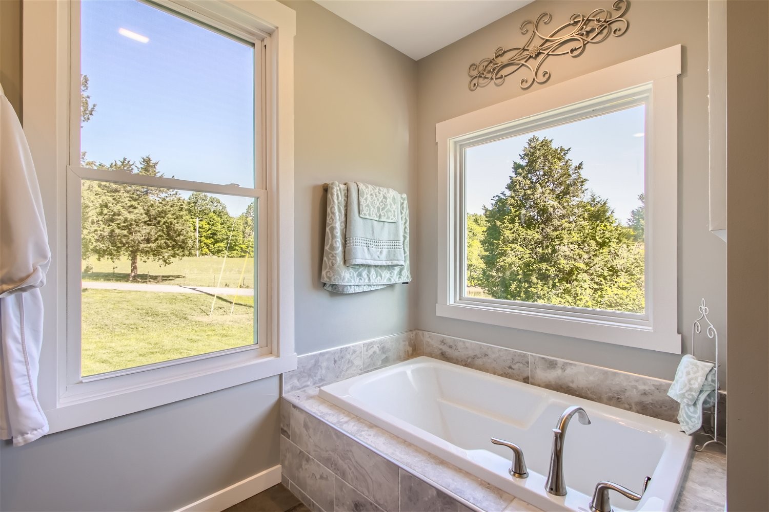190 Mitchell Road Portland, TN 37148 - Photo 21 of 28 a bath tub sitting in a bathroom next to a window