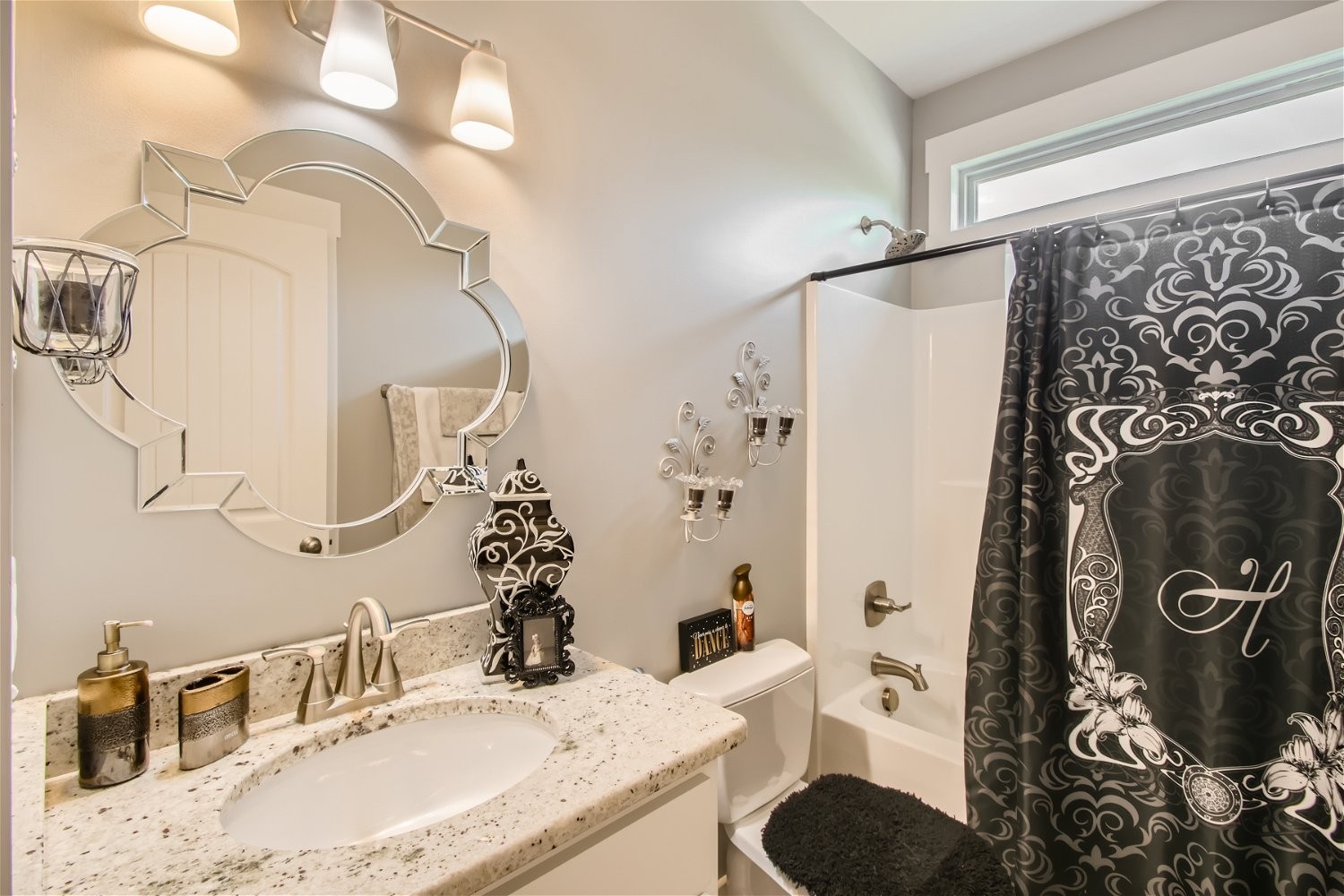 190 Mitchell Road Portland, TN 37148 - Photo 24 of 28 a bathroom with a granite countertop sink and a mirror