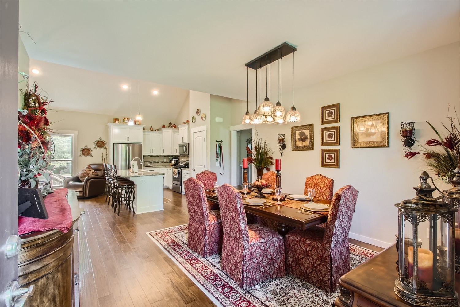 190 Mitchell Road Portland, TN 37148 - Photo 6 of 28 a living room with furniture a dining table and a chandelier