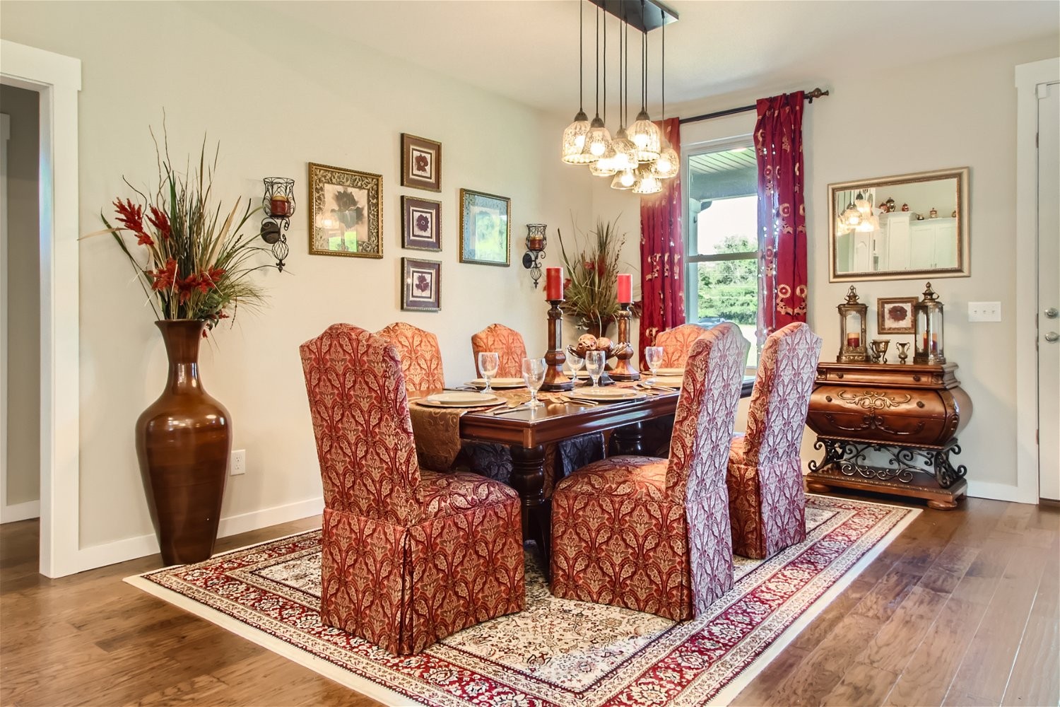 190 Mitchell Road Portland, TN 37148 - Photo 7 of 28 a view of a dining room with furniture a chandelier and wooden floor