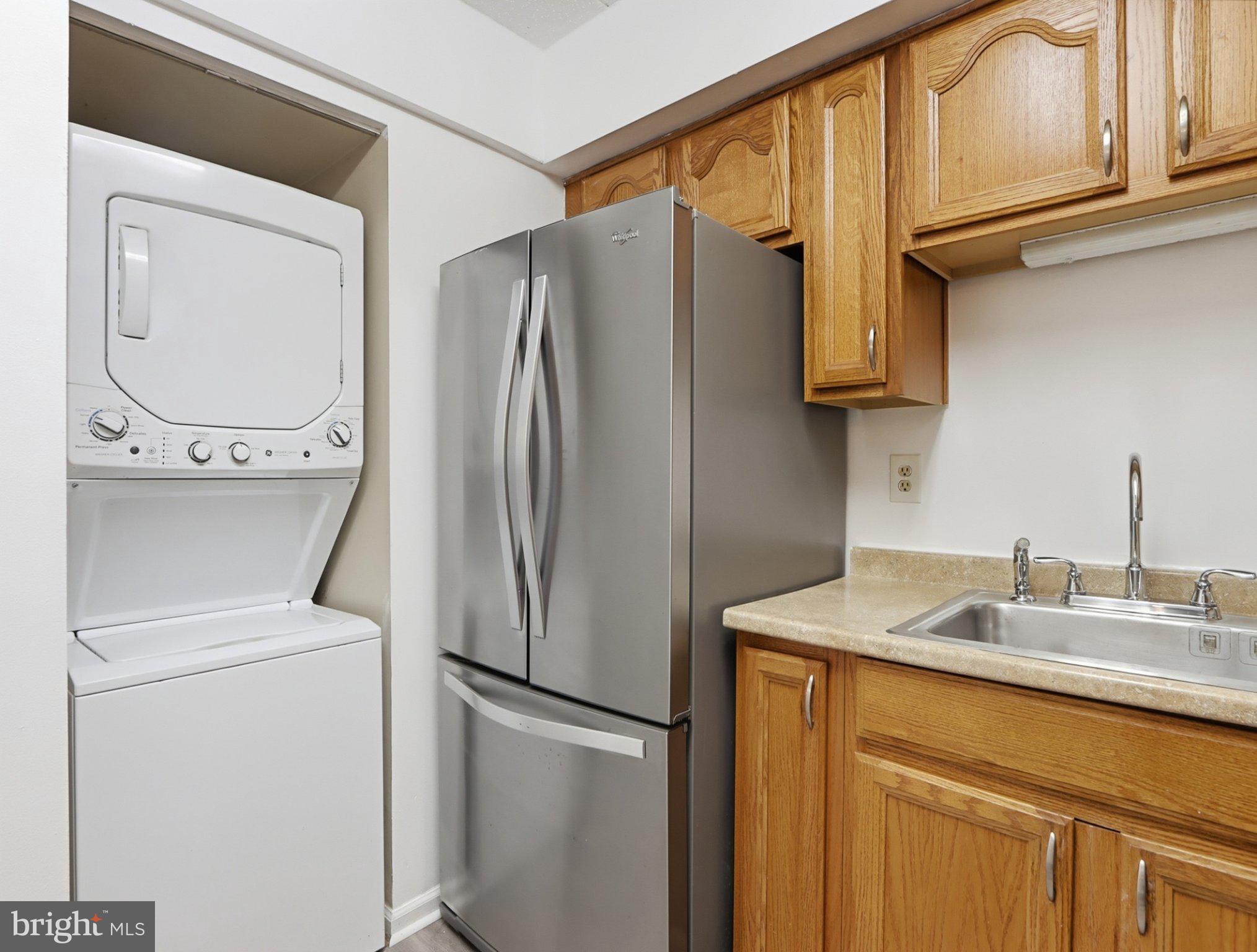 416 Terry Court, Unit A3 Frederick, MD 21701 - Photo 14 of 29 a utility room with dryer and washer