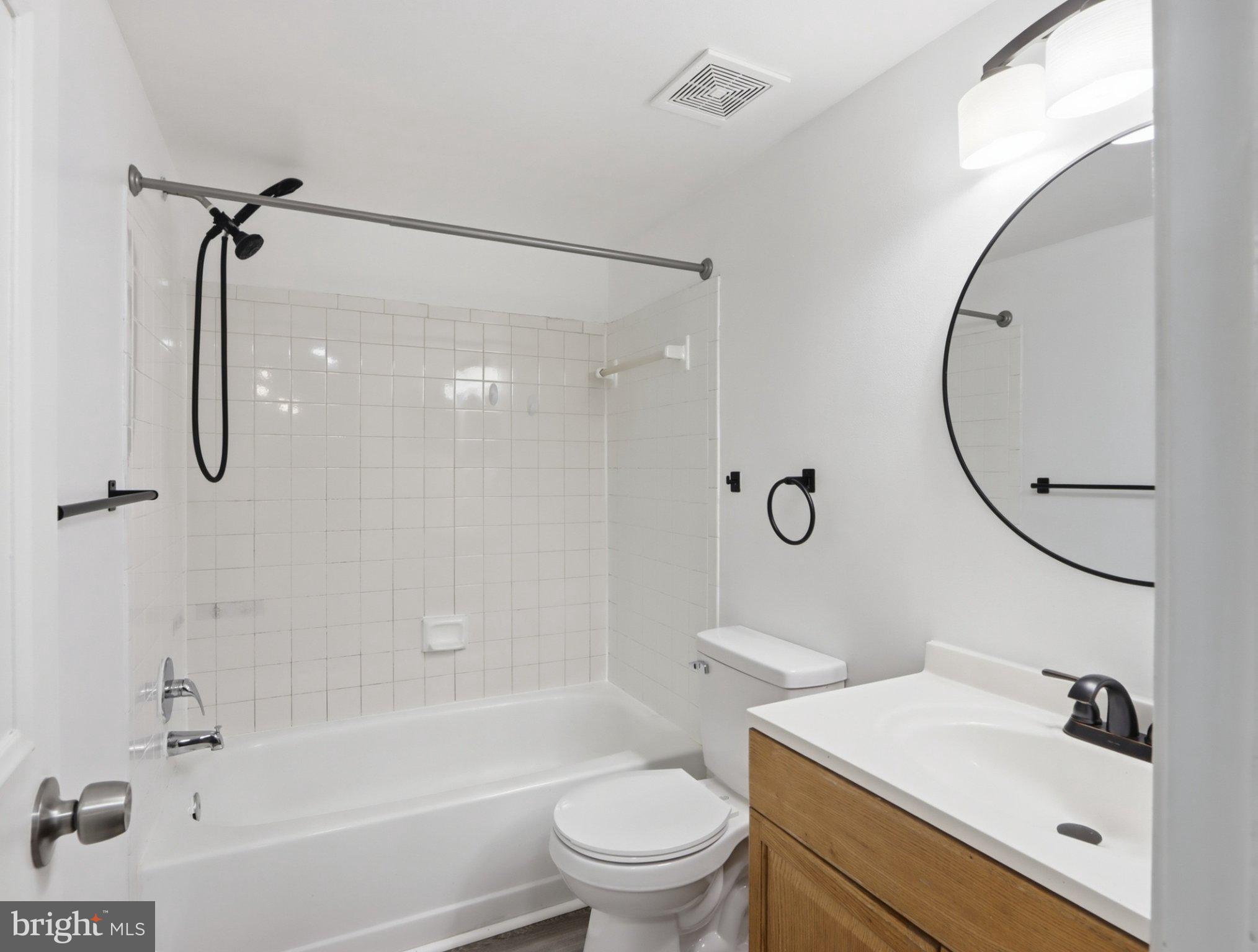 416 Terry Court, Unit A3 Frederick, MD 21701 - Photo 17 of 29 a bathroom with a sink toilet tub and shower