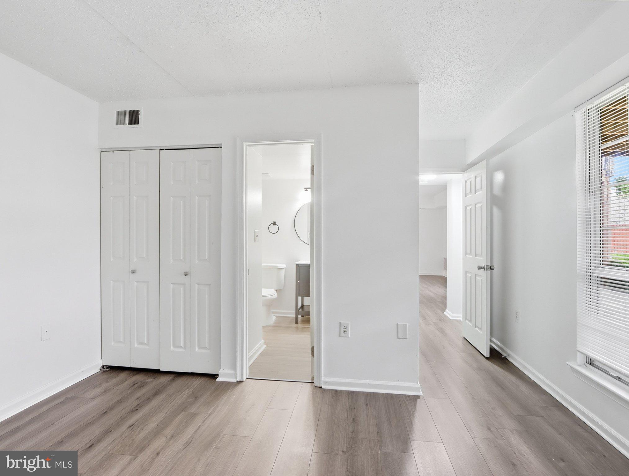 416 Terry Court, Unit A3 Frederick, MD 21701 - Photo 22 of 29 a view of a bathroom with wooden floor