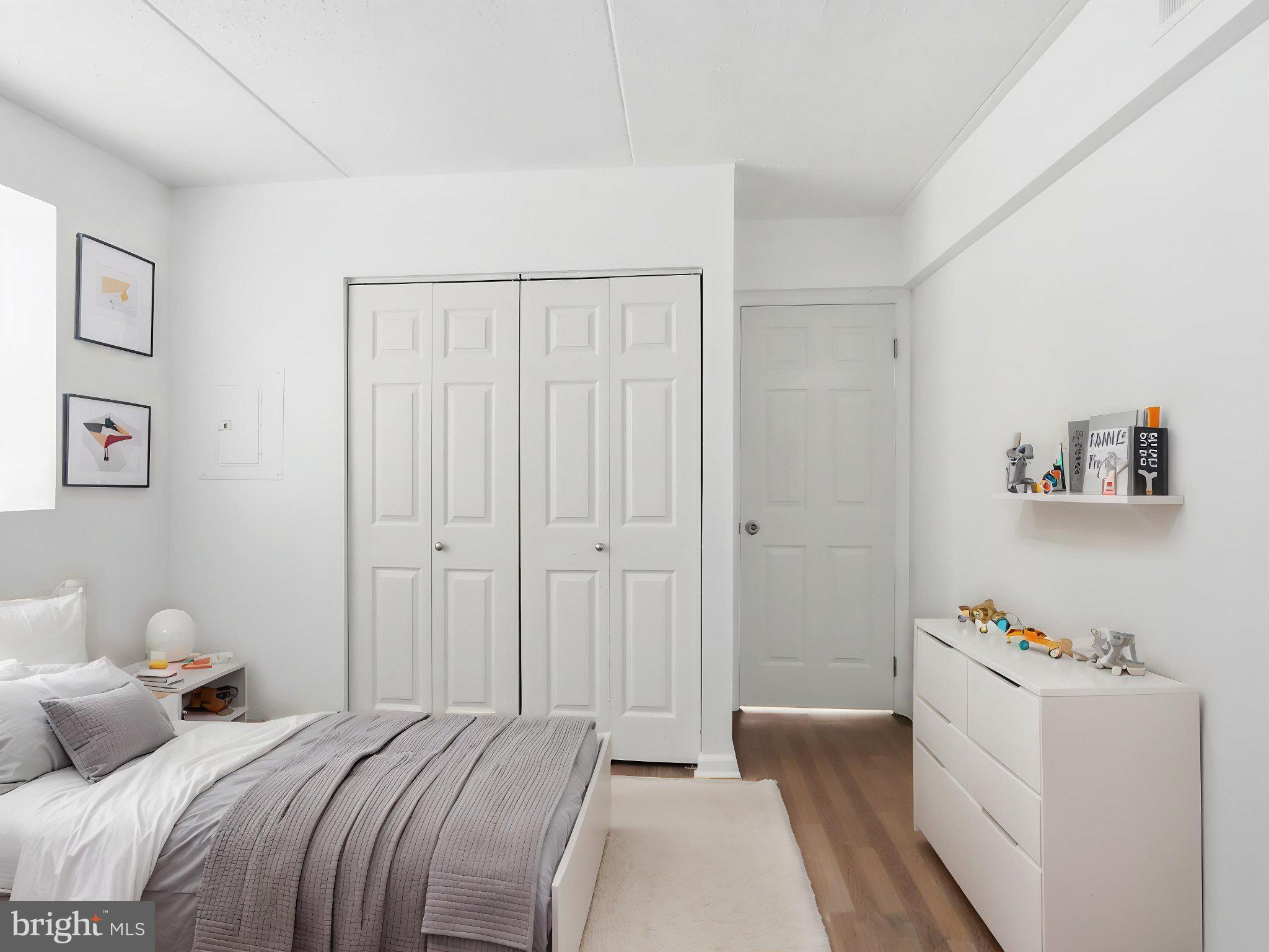 416 Terry Court, Unit A3 Frederick, MD 21701 - Photo 7 of 29 a bedroom with a bed and a window