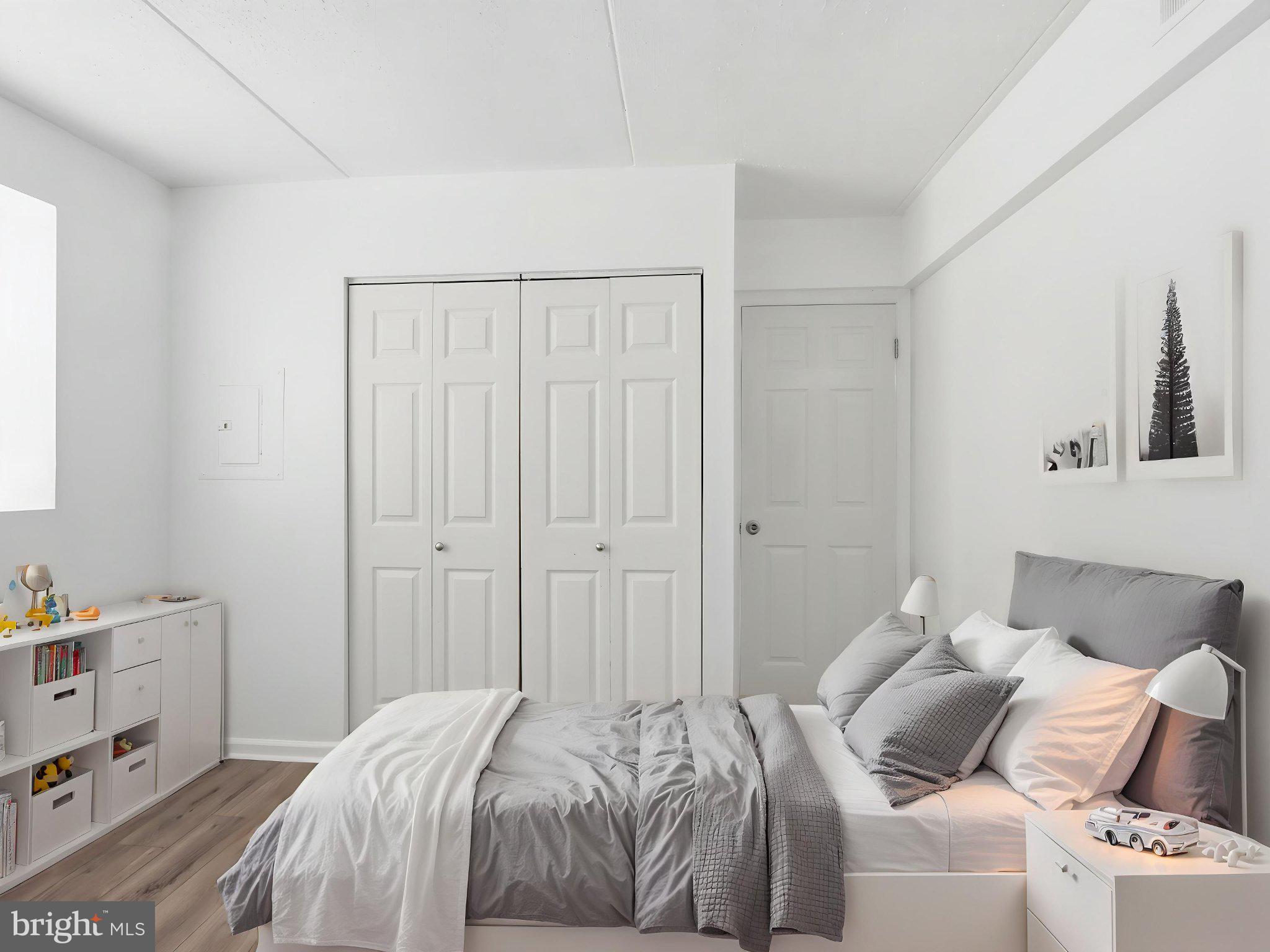 416 Terry Court, Unit A3 Frederick, MD 21701 - Photo 8 of 29 a bedroom with a bed and a window
