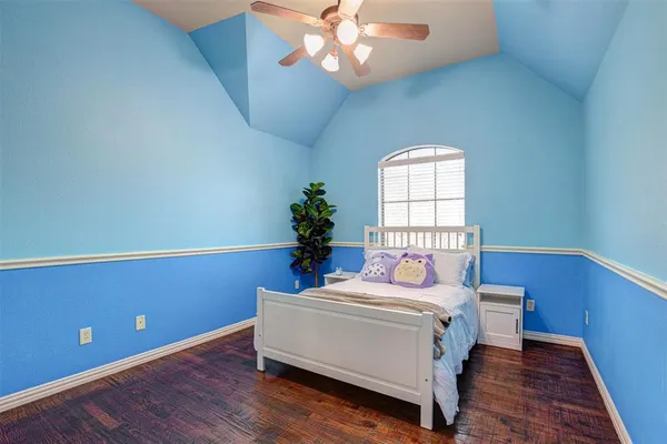 a room with a bed and a window