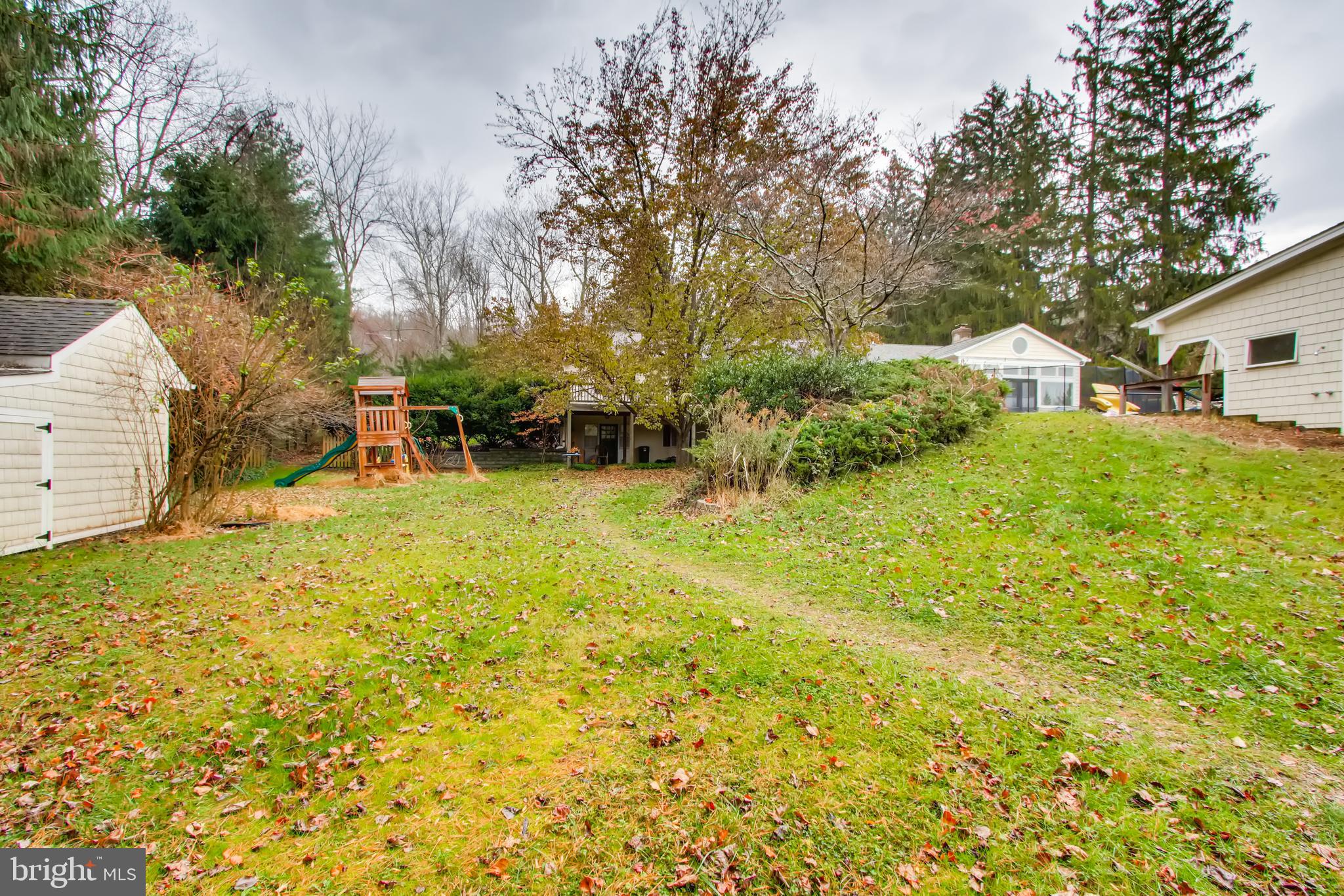 4427 Butler Road Glyndon, MD 21136 - Photo 22 of 27 Tree Lined Backyard