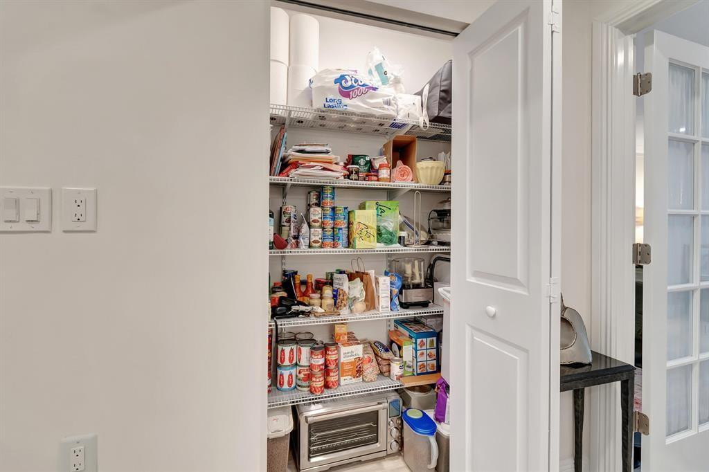 5520 North Ocean Boulevard, Unit 210 Ocean Ridge, FL 33435 - Photo 15 of 40 a room with storage and utility room