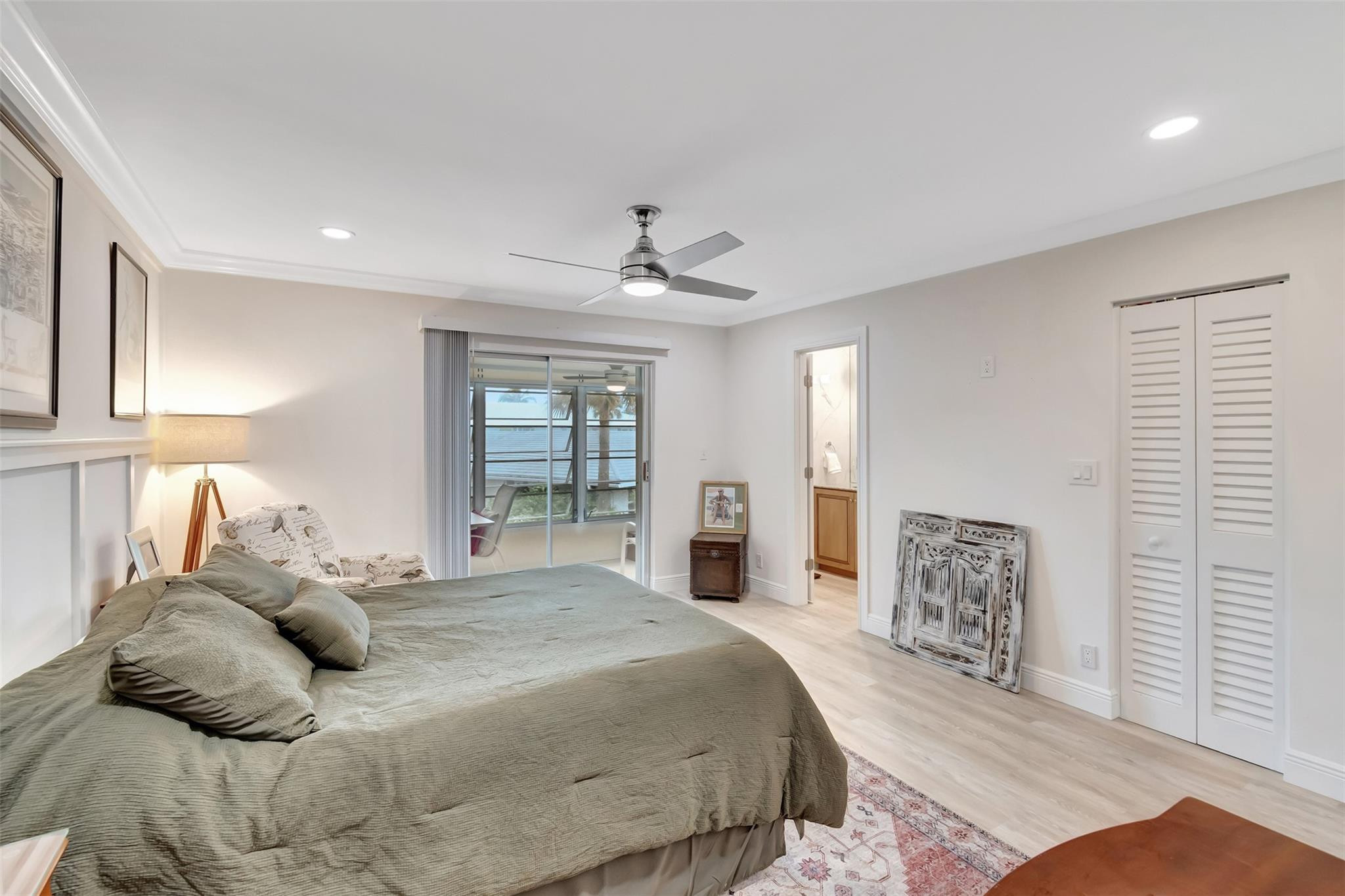 5520 North Ocean Boulevard, Unit 210 Ocean Ridge, FL 33435 - Photo 18 of 40 a bedroom with a large bed and a window