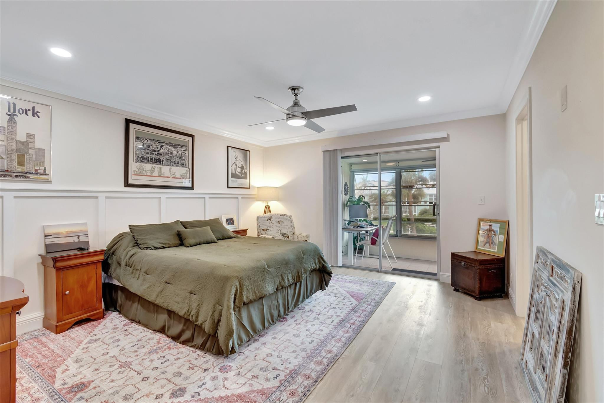 5520 North Ocean Boulevard, Unit 210 Ocean Ridge, FL 33435 - Photo 19 of 40 a bedroom with a large bed and furniture