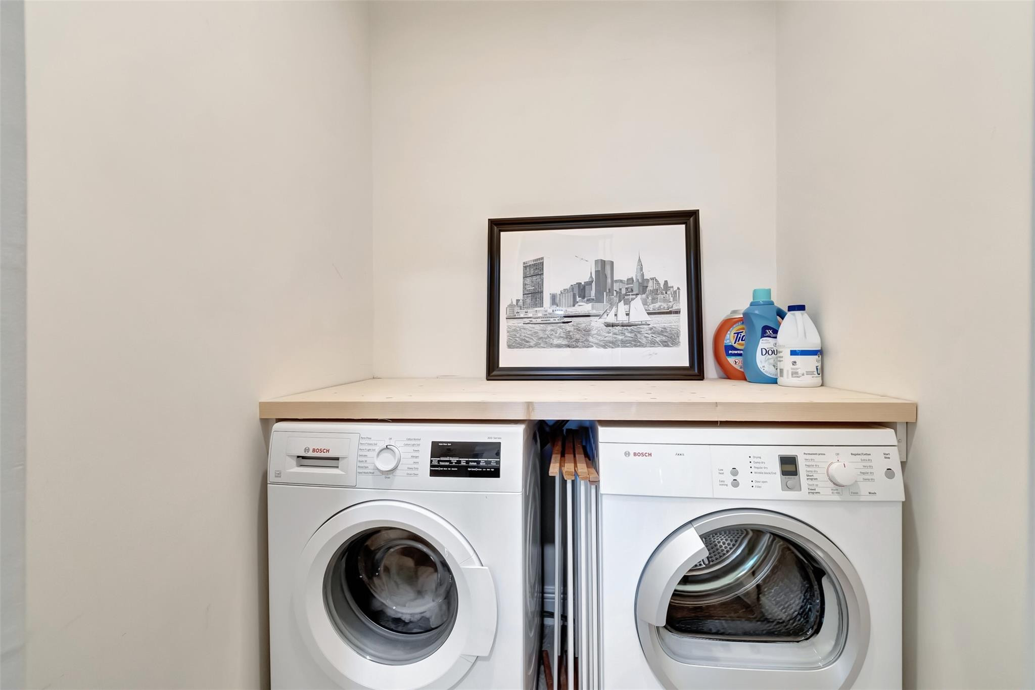 5520 North Ocean Boulevard, Unit 210 Ocean Ridge, FL 33435 - Photo 20 of 40 a view of a hallway with washer and dryer