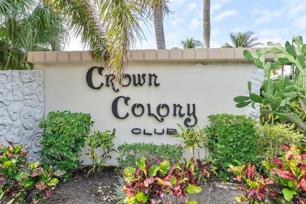 5520 North Ocean Boulevard, Unit 210 Ocean Ridge, FL 33435 - Photo 2 of 40 a wall with a bunch of flowers and trees