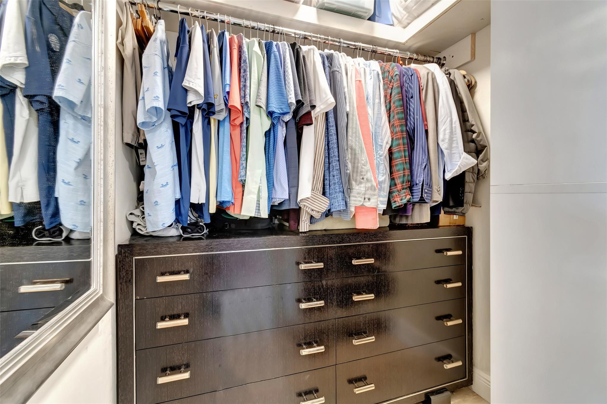 5520 North Ocean Boulevard, Unit 210 Ocean Ridge, FL 33435 - Photo 21 of 40 a view of walk in closet with clothes
