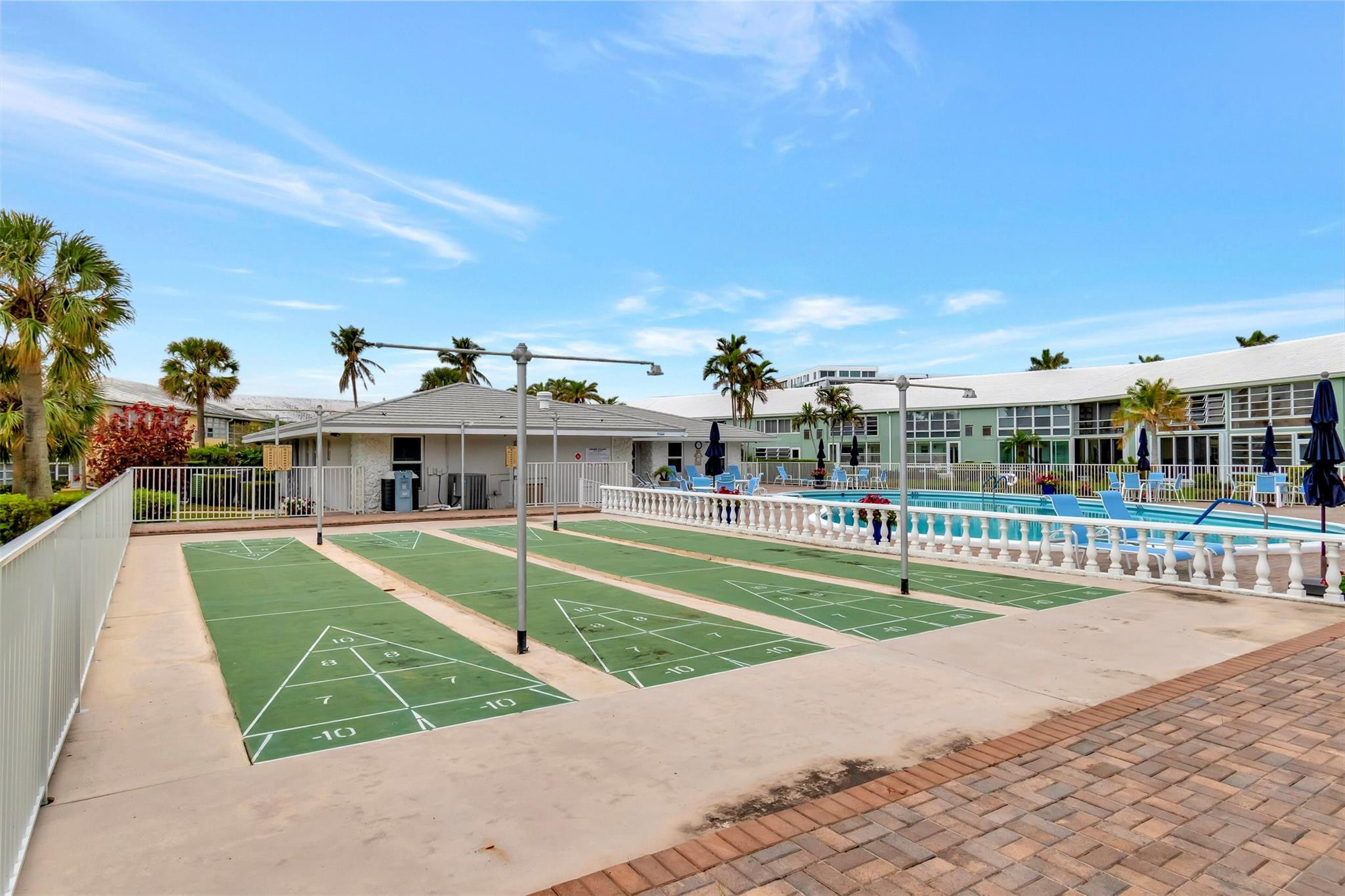 5520 North Ocean Boulevard, Unit 210 Ocean Ridge, FL 33435 - Photo 31 of 40 a view of house with a swimming pool