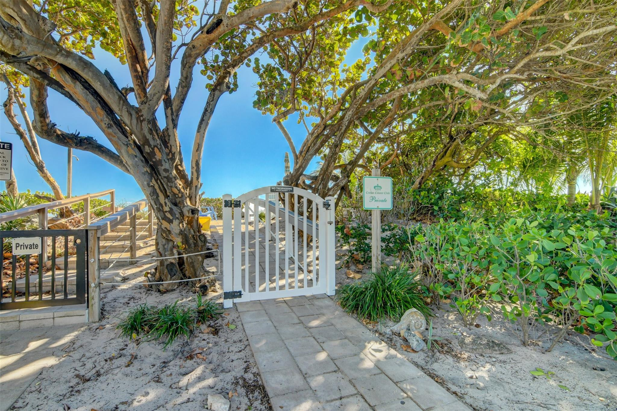 5520 North Ocean Boulevard, Unit 210 Ocean Ridge, FL 33435 - Photo 37 of 40 a pathway of a house with a trees