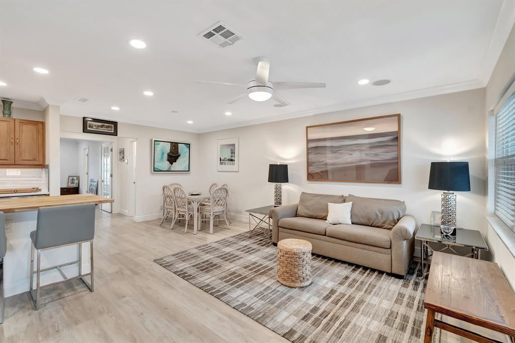5520 North Ocean Boulevard, Unit 210 Ocean Ridge, FL 33435 - Photo 8 of 40 a living room with furniture