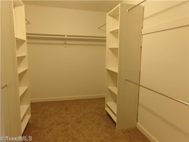 4111 Witherow Road Winston-Salem, NC 27106 - Photo 11 of 16 Master Bedroom. Master bedroom closet with lots of room for hanging and folded clothes.